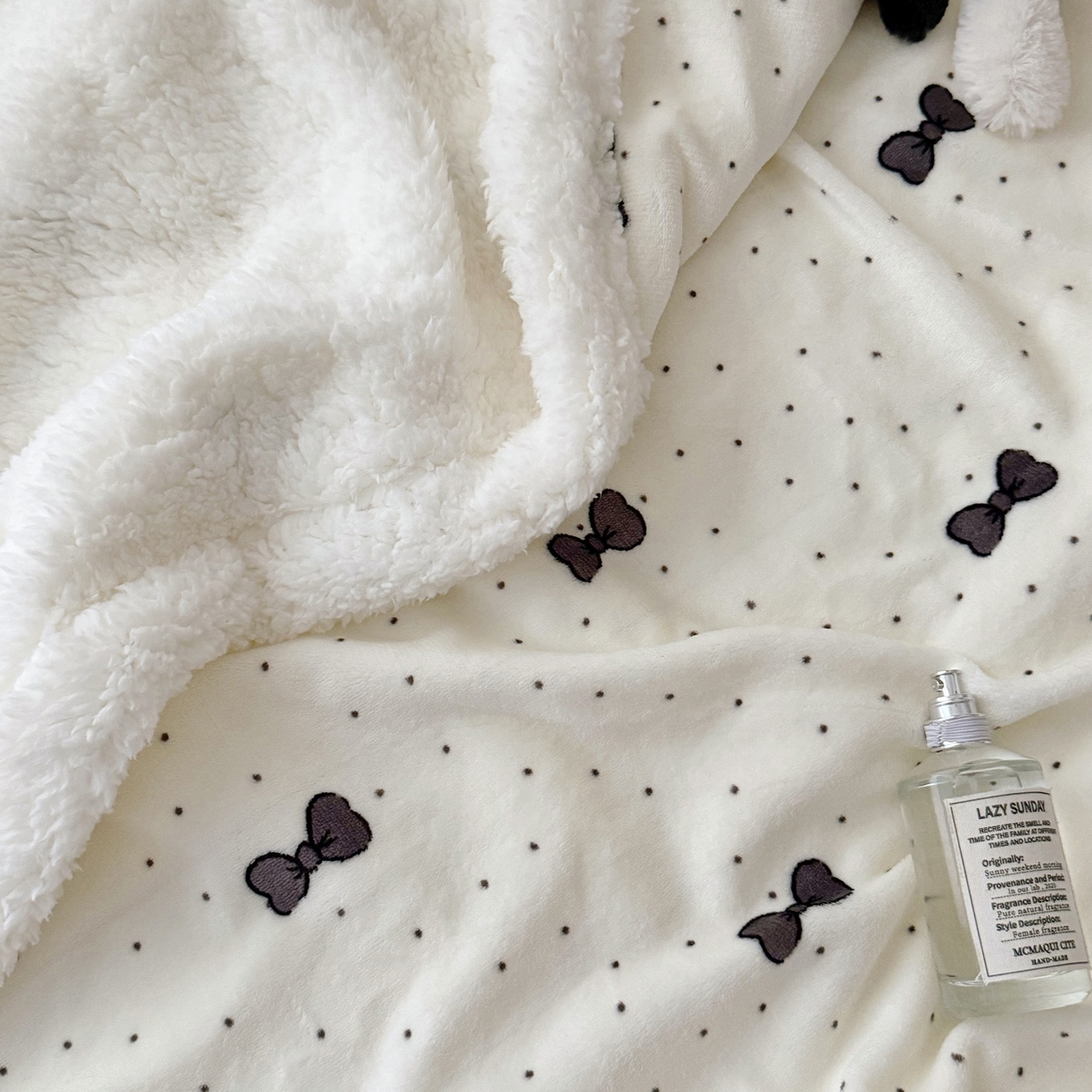 91家纺网 家纺一手货源 找家纺 航途席业 2025新款200g牛奶绒羊羔绒毛毯 波点蝴蝶结