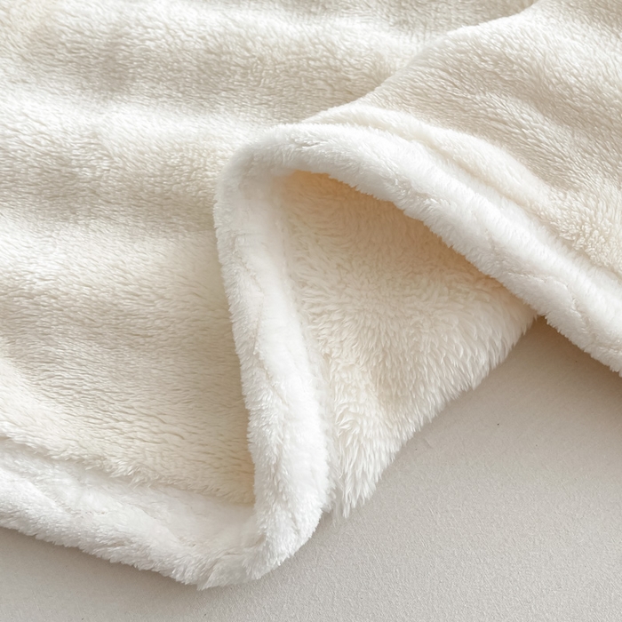 91家纺网 家纺一手货源 找家纺 梵克保罗 2025新款仿兔毛泡泡绒牛奶绒毛毯盖毯包边毛毯 米白