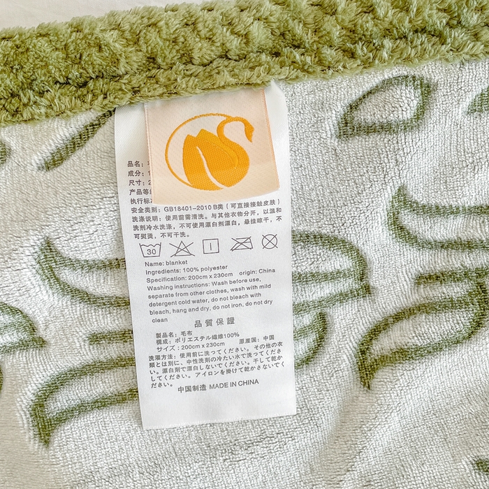 91家纺网 家纺一手货源 找家纺 梵克保罗 2025新款背印剪花牛奶绒菠萝格复合毛毯 草绿