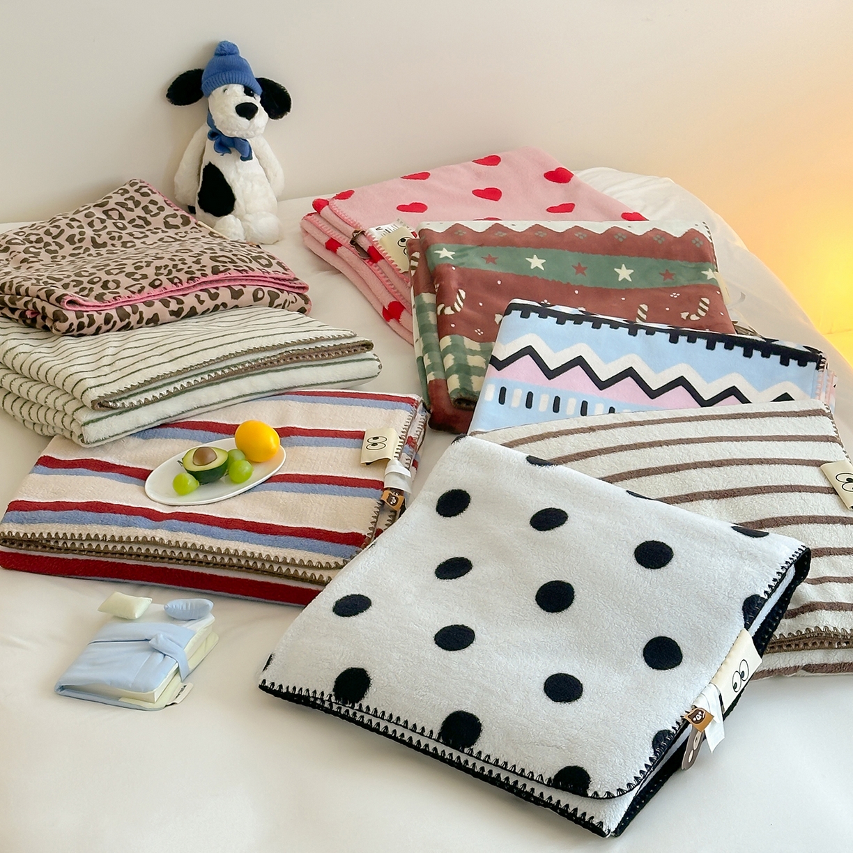 91家纺网 家纺一手货源 找家纺 （总）桃子家居 2025新款A类ins加厚半边绒米粒绒牛奶绒三角针贝壳边多功能毛毯毯子