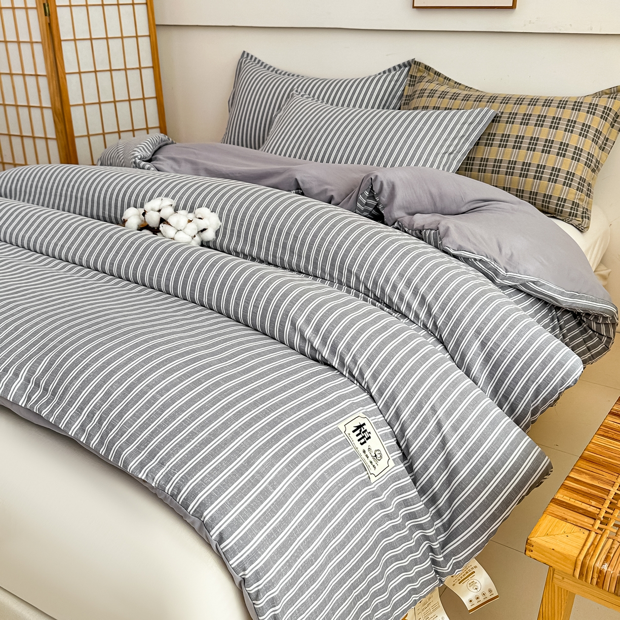 91家纺网 家纺一手货源 找家纺 好欣怡家纺 2026新款A类新疆棉花被可拆洗无印风格子水洗棉棉花被芯冬被学生四季被 条纹灰