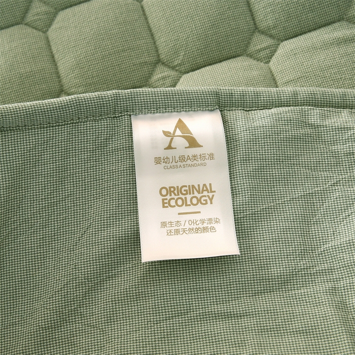 91家纺网 家纺一手货源 找家纺 梵克保罗 2025新款无印风全棉色织水洗棉夹棉床笠 千鸟格绿