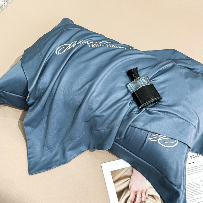 91家纺网 家纺一手货源 找家纺 悦织湾家纺 亲肤120克水洗棉磨毛刺绣纯色四件套2025新款轻奢韩版公主风精致床上用品绣花4件套 宽境宾利蓝