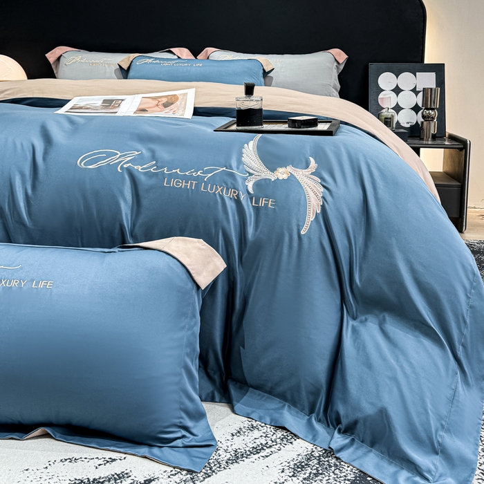 91家纺网 家纺一手货源 找家纺 悦织湾家纺 亲肤120克水洗棉磨毛刺绣纯色四件套2025新款轻奢韩版公主风精致床上用品绣花4件套 宽境宾利蓝