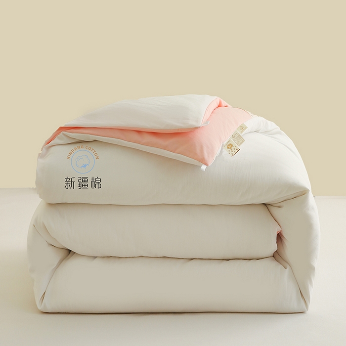 91家纺网 家纺一手货源 找家纺 爱诗诺家纺 2025新款拼色无印风新疆棉花被春秋被夏被四季被被子被芯 白+粉