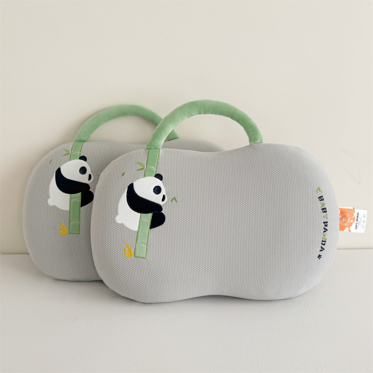 麦肯锡 2025新款暖绒手提熊猫猫肚枕 枕头枕芯 灰色