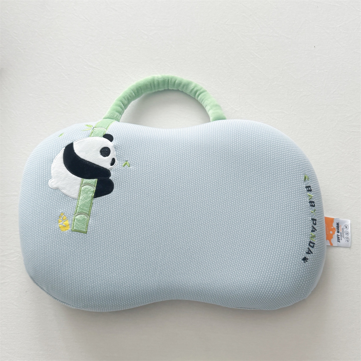 91家纺网 家纺一手货源 找家纺 麦肯锡 2025新款暖绒手提熊猫猫肚枕 枕头枕芯 蓝色