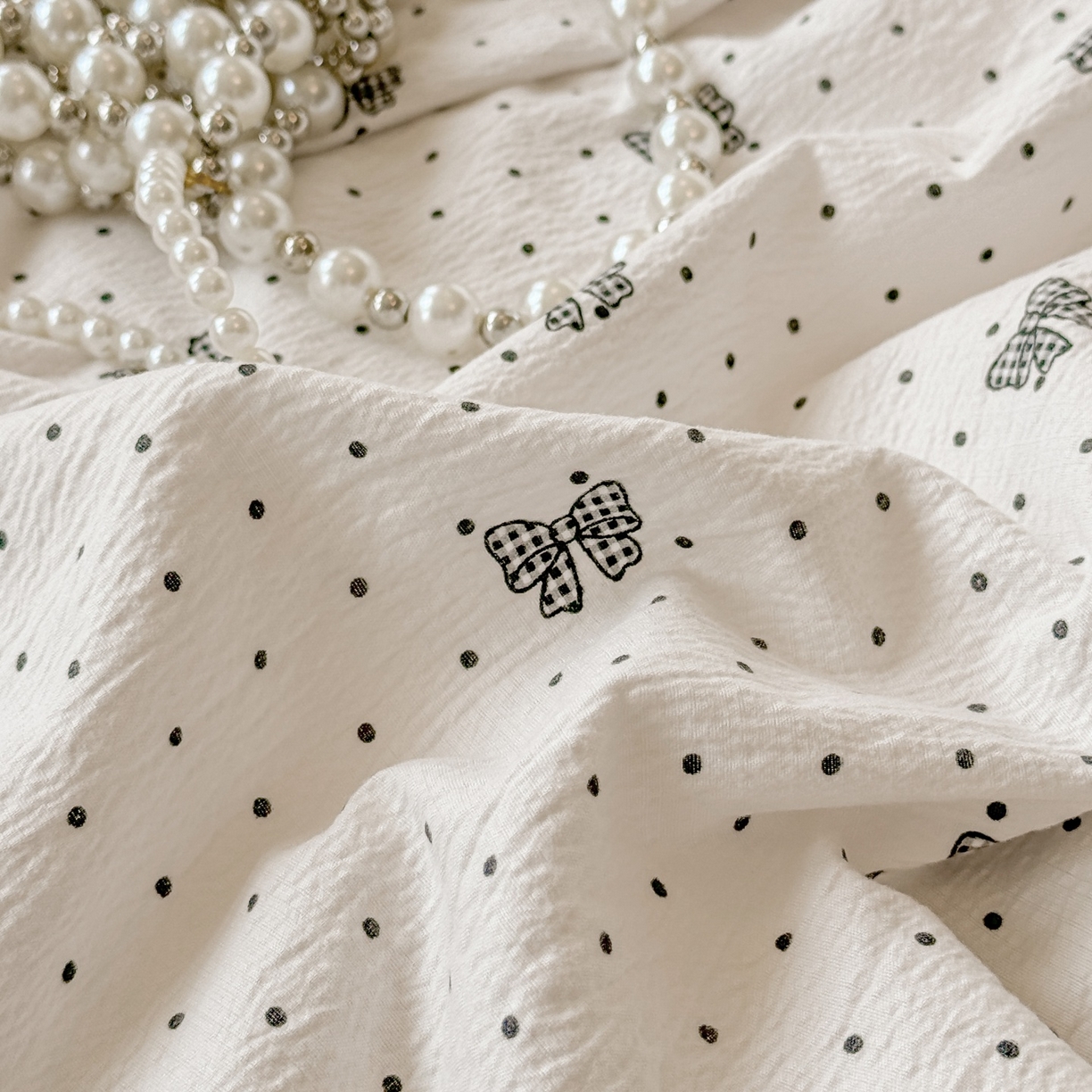 91家纺网 家纺一手货源 找家纺 汣沐生活 2025新款A类木棉双层纱印花床笠 星梦蝴蝶结