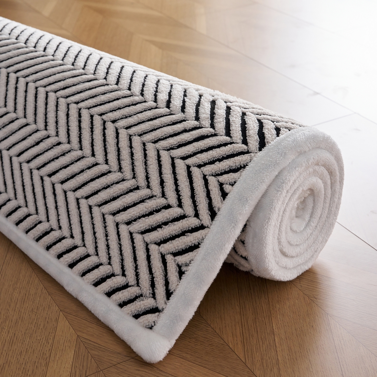 91家纺网 家纺一手货源 找家纺 航途席业 2025新款亲肤舒适地垫 莫尼-黑白