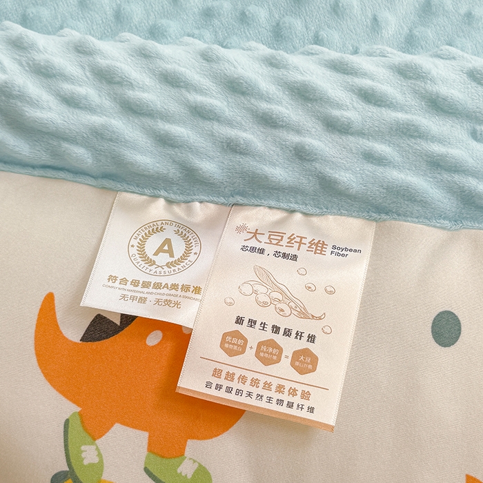 91家纺网 家纺一手货源 找家纺 天瑜家纺205新款A类针织面料手包豆豆绒冬被大豆被 恐龙宝贝兰