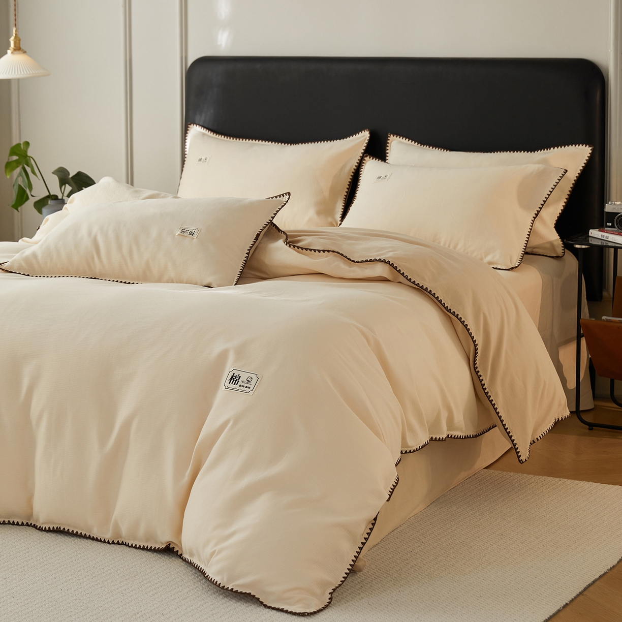 91家纺网 家纺一手货源 找家纺 简宜家居（朝初家纺） 2025新款全棉厚织长绒棉立体提花磨毛贝壳边四件套 奶杏织缕
