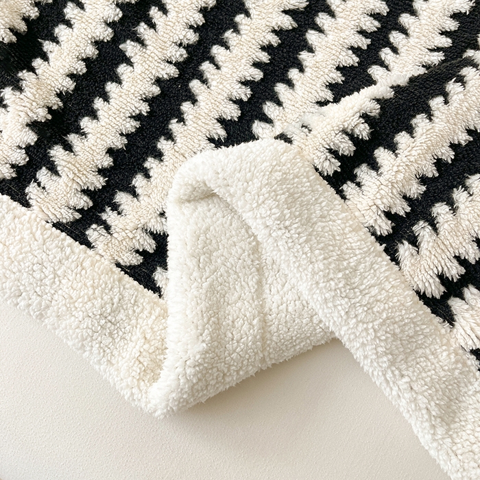 91家纺网 家纺一手货源 找家纺 可恩欣 2025新款舒棉绒提花双层毛毯-留白-羽墨西雅黑