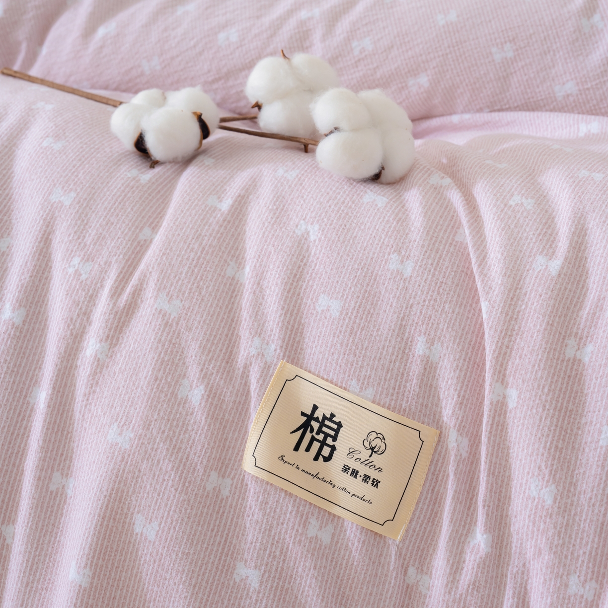 91家纺网 家纺一手货源 找家纺 蓝冰家纺 2025新款亚麻棉花冬被 粉色蝴蝶结