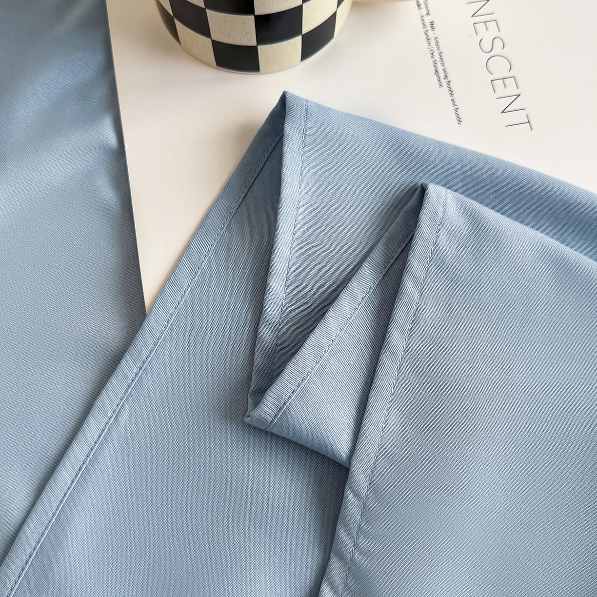 91家纺网 家纺一手货源 找家纺 十一家居 2025年新款ins风A类母婴级亲肤云朵水洗棉单床单 浅蓝