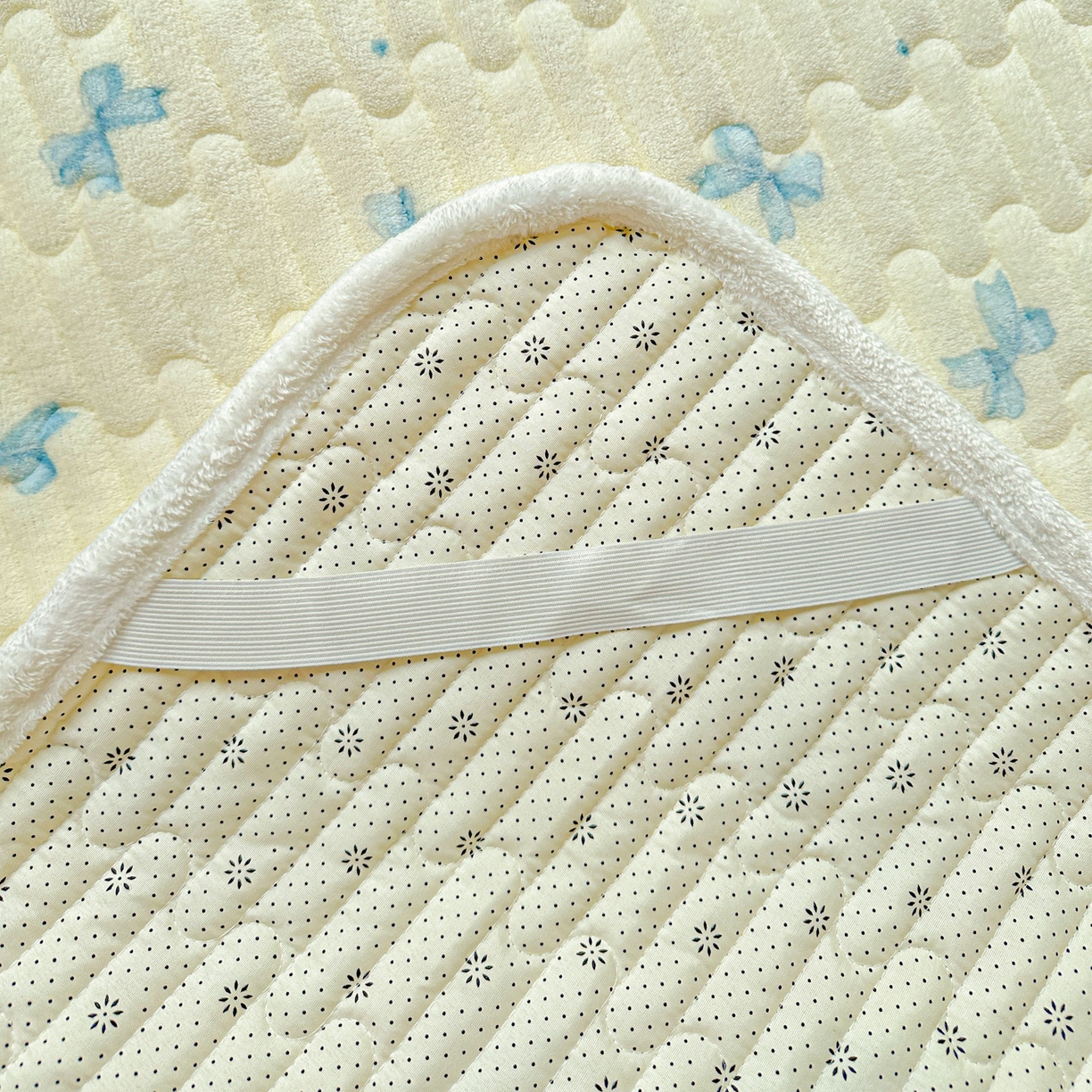 91家纺网 家纺一手货源 找家纺 水木坊 2025新款牛奶绒床垫保护垫床褥床垫子 幸运蝴蝶结