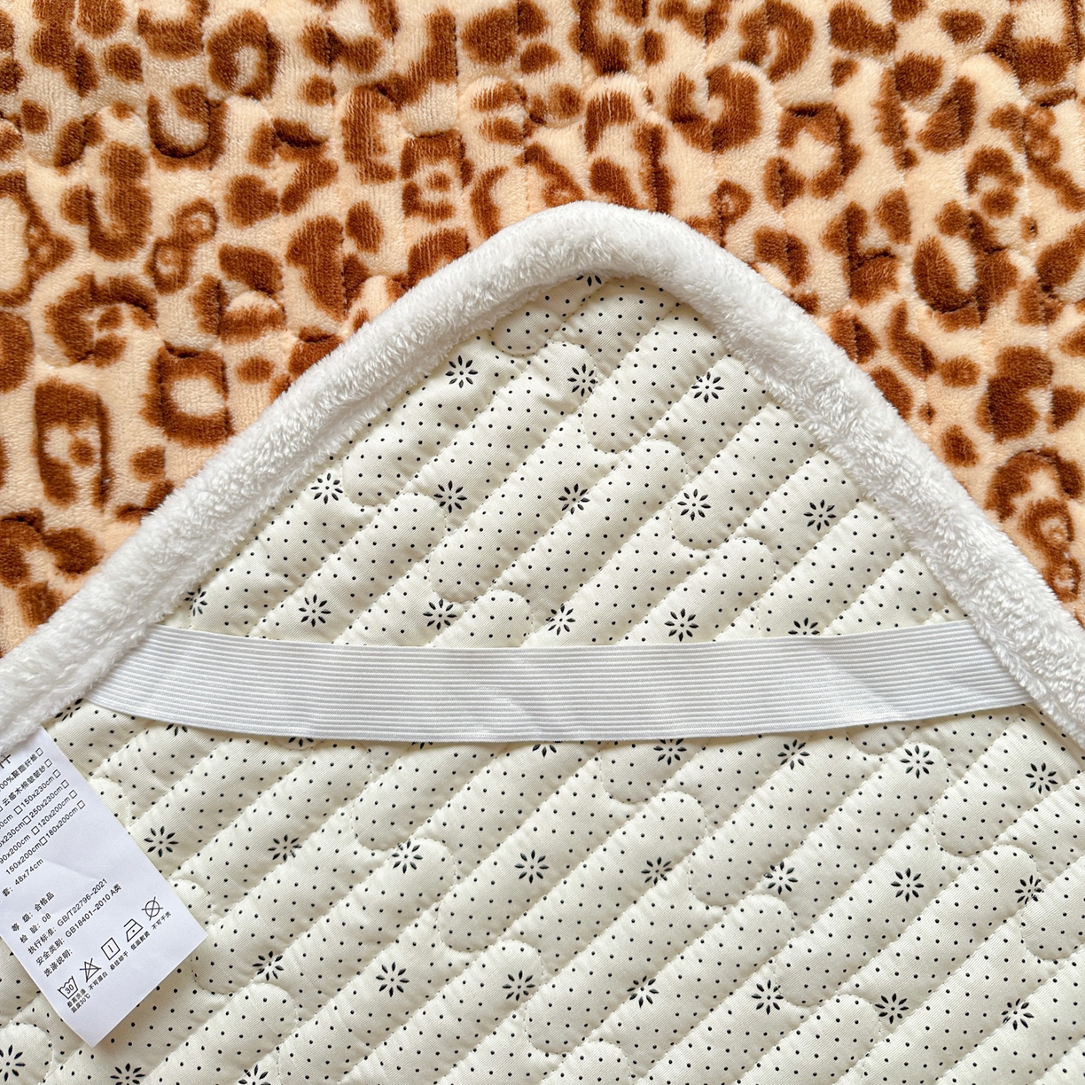 91家纺网 家纺一手货源 找家纺 水木坊 2025新款牛奶绒床垫保护垫床褥床垫子 性感豹纹