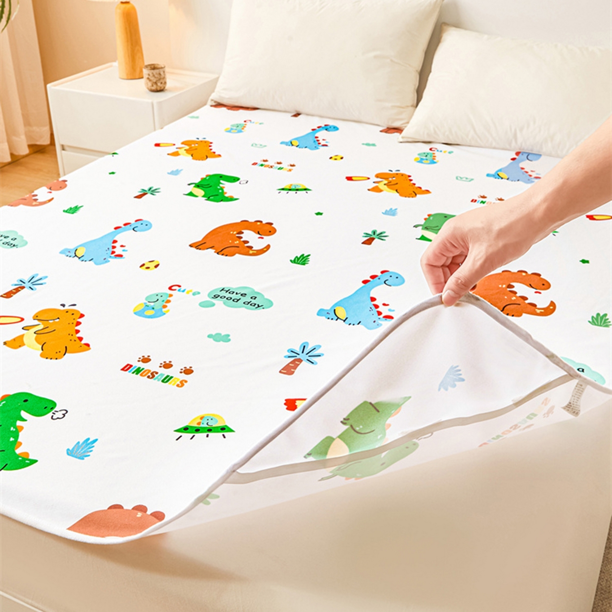 91家纺网 家纺一手货源 找家纺 雯豆家纺 2025新款防水隔尿垫子卡通成人床垫保护罩A类宝宝尿垫 防水隔尿垫-小恐龙