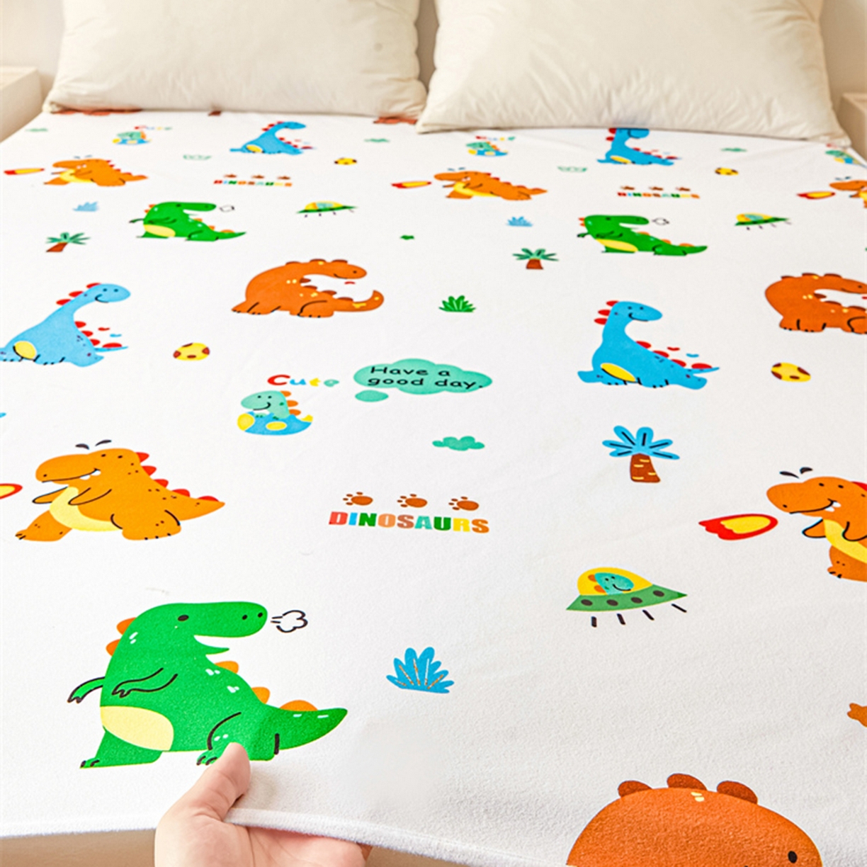 91家纺网 家纺一手货源 找家纺 雯豆家纺 2025新款防水隔尿垫子卡通成人床垫保护罩A类宝宝尿垫 防水隔尿垫-小恐龙