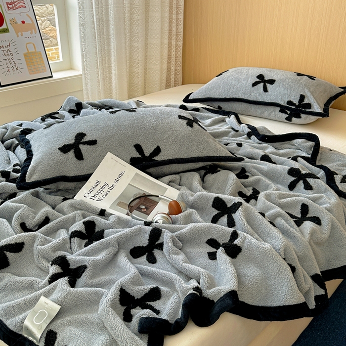 91家纺网 家纺一手货源 找家纺 春光里 2025新款双面阳离子毛毯 蝴蝶结