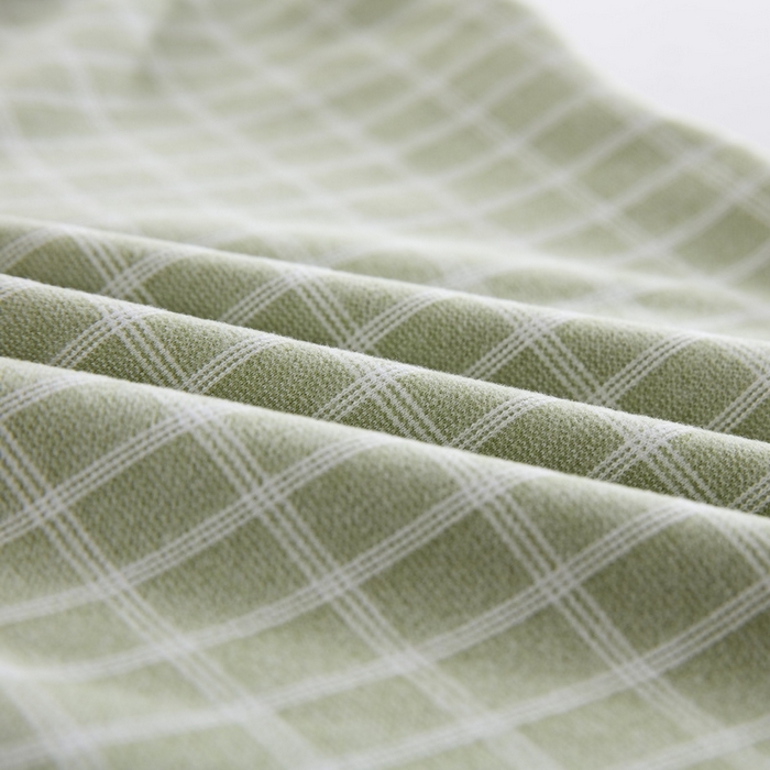 91家纺网 家纺一手货源 找家纺 大黄蜂家居家纺 2025新款暖感德绒万能魔术枕套 草绿小格