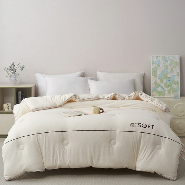 91家纺网 家纺一手货源 找家纺 蓝雀翎 2025新款木棉提花蚕蛹蛋白被子被芯 米白