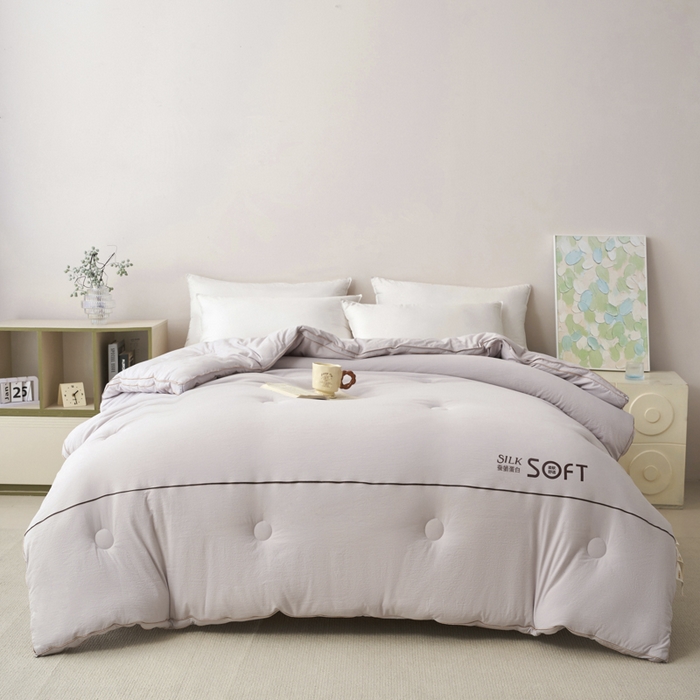 91家纺网 家纺一手货源 找家纺 蓝雀翎 2025新款木棉提花蚕蛹蛋白被子被芯 灰色