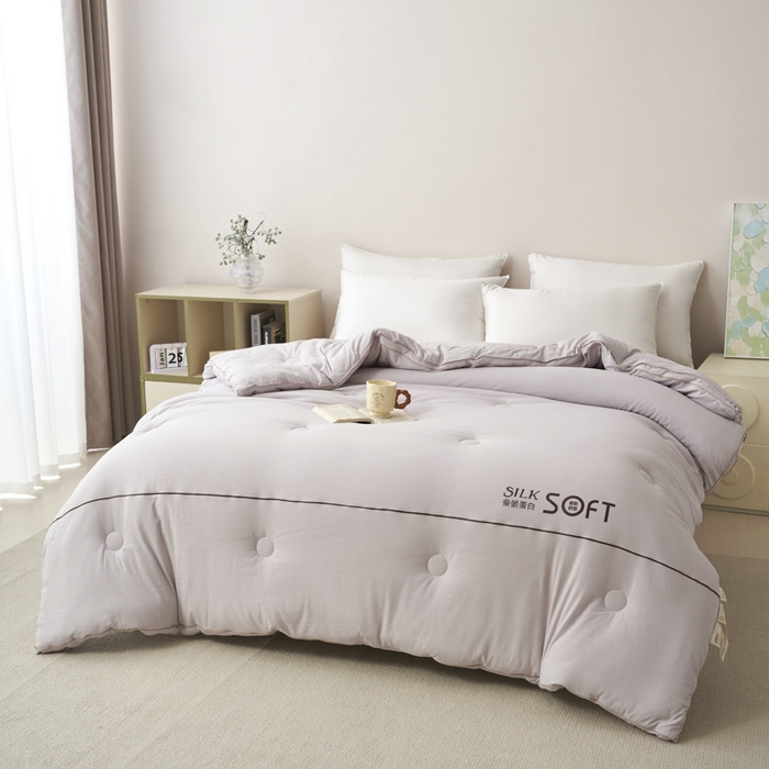 91家纺网 家纺一手货源 找家纺 蓝雀翎 2025新款木棉提花蚕蛹蛋白被子被芯 灰色