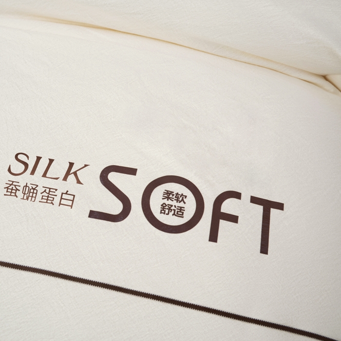 91家纺网 家纺一手货源 找家纺 蓝雀翎 2025新款木棉提花蚕蛹蛋白被子被芯 米白