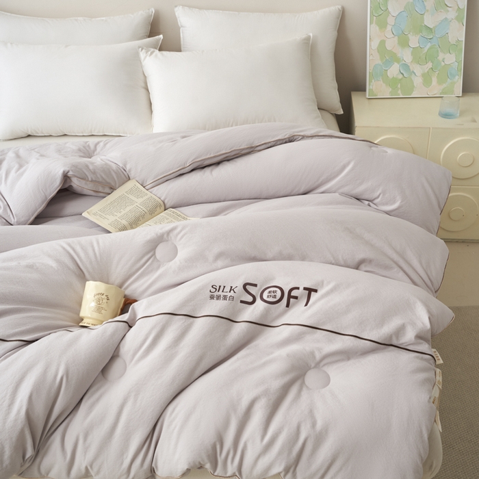 91家纺网 家纺一手货源 找家纺 蓝雀翎 2025新款木棉提花蚕蛹蛋白被子被芯 灰色