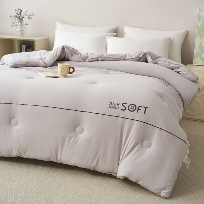 91家纺网 家纺一手货源 找家纺 蓝雀翎 2025新款木棉提花蚕蛹蛋白被子被芯 灰色