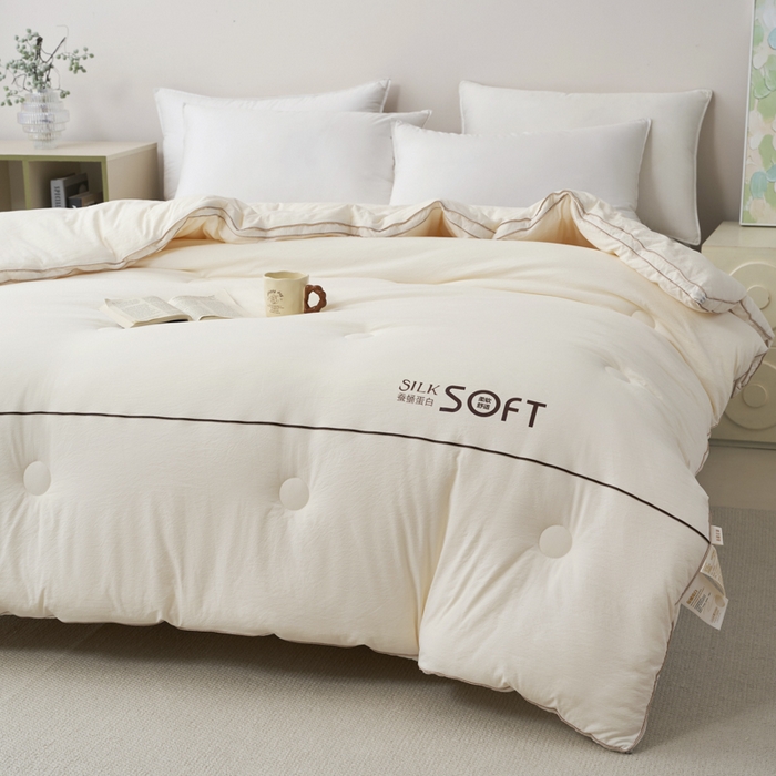 91家纺网 家纺一手货源 找家纺 蓝雀翎 2025新款木棉提花蚕蛹蛋白被子被芯 米白