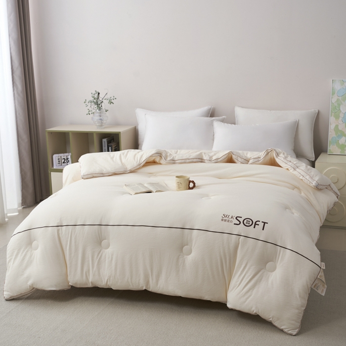 91家纺网 家纺一手货源 找家纺 蓝雀翎 2025新款木棉提花蚕蛹蛋白被子被芯 米白