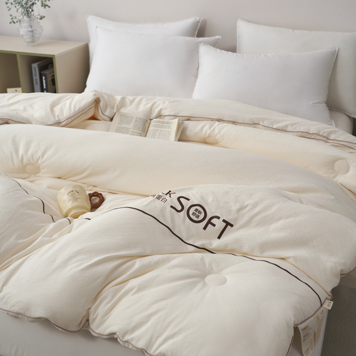 91家纺网 家纺一手货源 找家纺 蓝雀翎 2025新款木棉提花蚕蛹蛋白被子被芯 米白