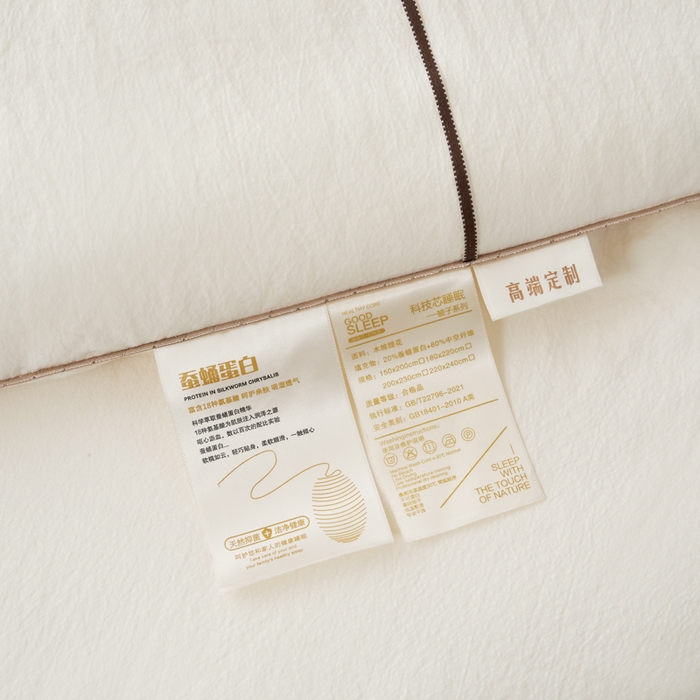 91家纺网 家纺一手货源 找家纺 蓝雀翎 2025新款木棉提花蚕蛹蛋白被子被芯 米白