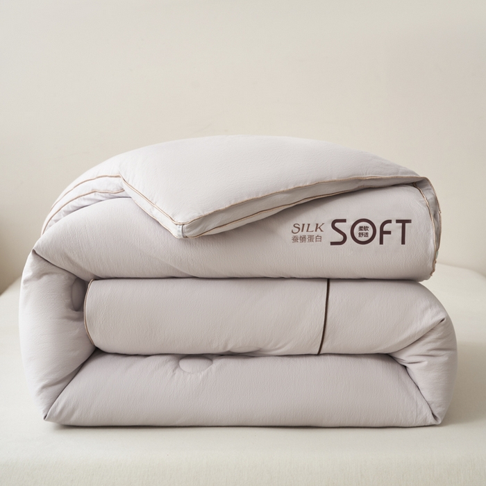 91家纺网 家纺一手货源 找家纺 蓝雀翎 2025新款木棉提花蚕蛹蛋白被子被芯 灰色