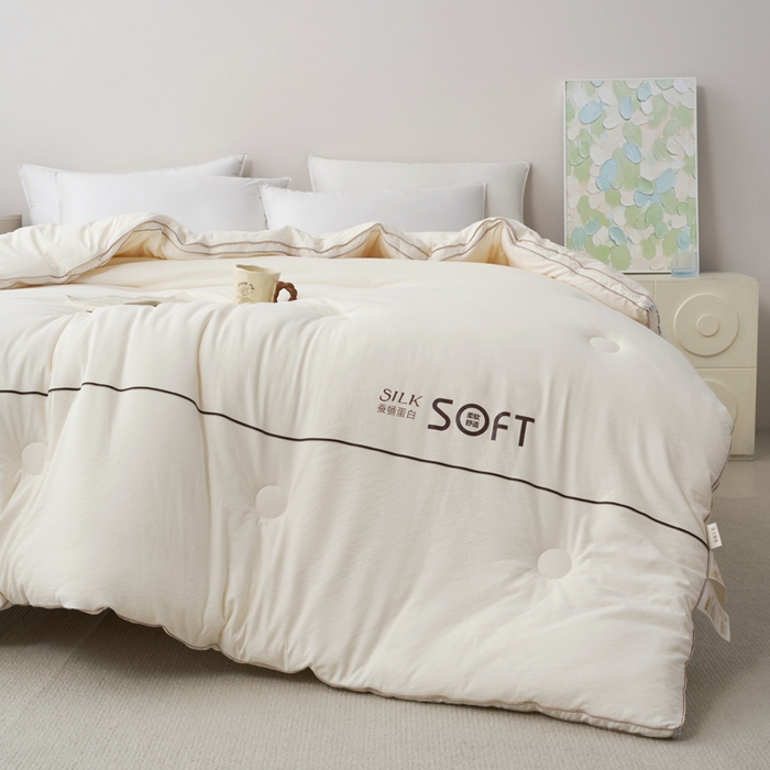 91家纺网 家纺一手货源 找家纺 蓝雀翎 2025新款木棉提花蚕蛹蛋白被子被芯 米白