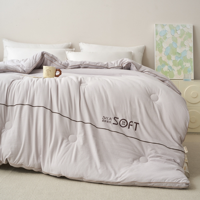 91家纺网 家纺一手货源 找家纺 蓝雀翎 2025新款木棉提花蚕蛹蛋白被子被芯 灰色