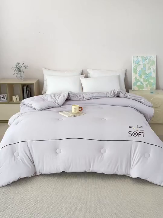 91家纺网 家纺一手货源 找家纺 蓝雀翎 2025新款木棉提花蚕蛹蛋白被子被芯 灰色