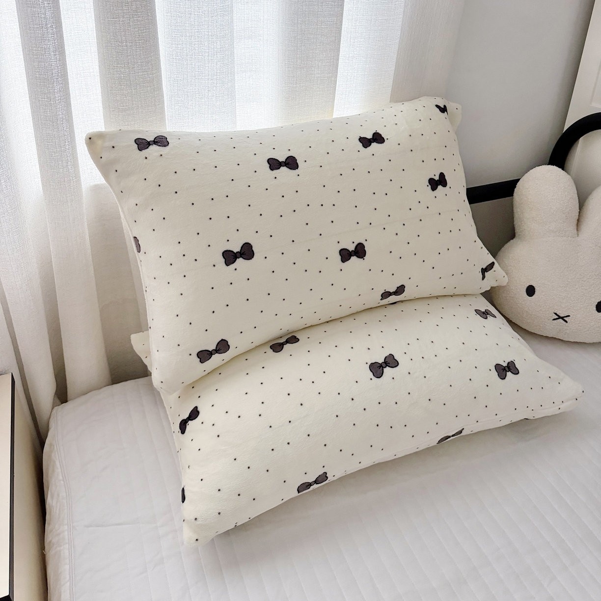 91家纺网 家纺一手货源 找家纺 寐居家纺 2025新款牛奶绒卡通毛毯系列 波点蝴蝶结