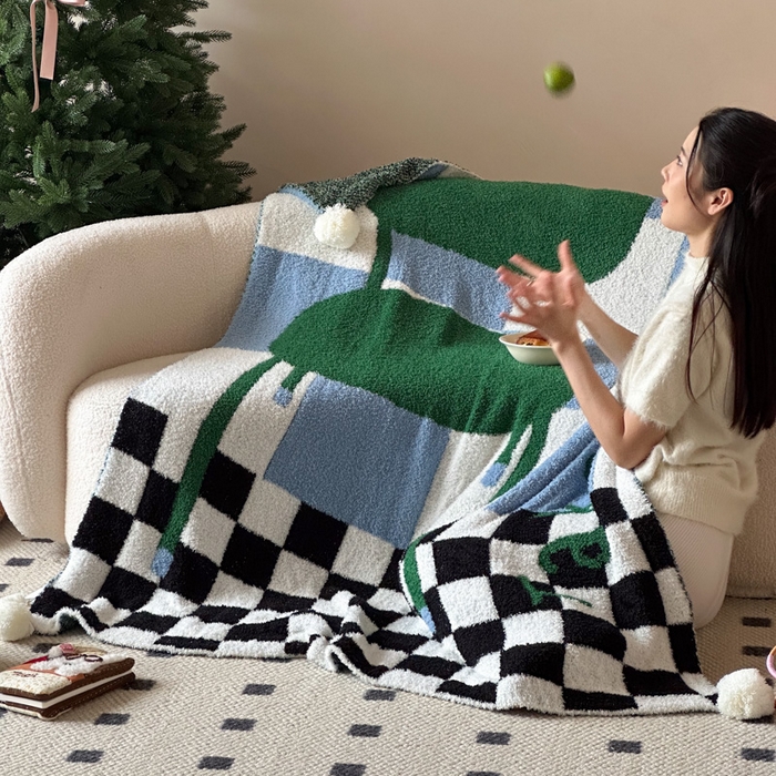 91家纺网 家纺一手货源 找家纺 Sweet dreams甜梦 2025新款轻奢高端毛球款半边绒针织毛毯 绿格子椅子