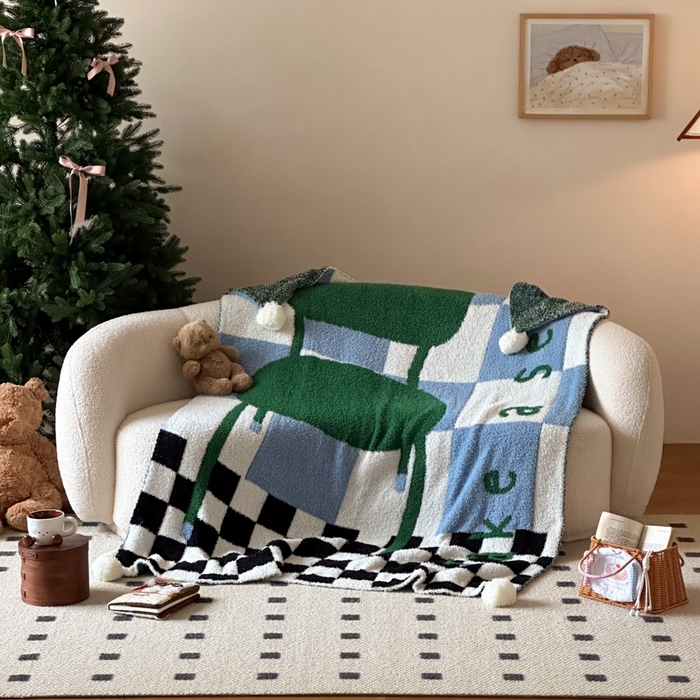 91家纺网 家纺一手货源 找家纺 Sweet dreams甜梦 2025新款轻奢高端毛球款半边绒针织毛毯 绿格子椅子