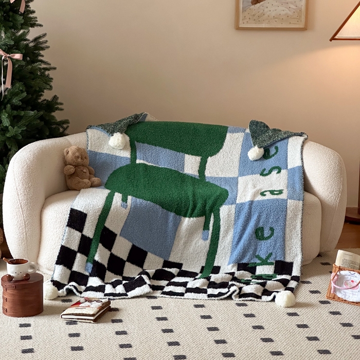 91家纺网 家纺一手货源 找家纺 Sweet dreams甜梦 2025新款轻奢高端毛球款半边绒针织毛毯 绿格子椅子