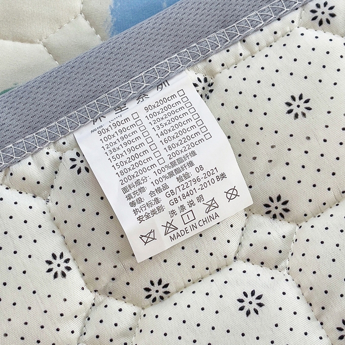 91家纺网 家纺一手货源 找家纺 小叮当家纺仓储工厂店 2025新款薄垫针织系列床护垫床垫-针织 针织蓝花