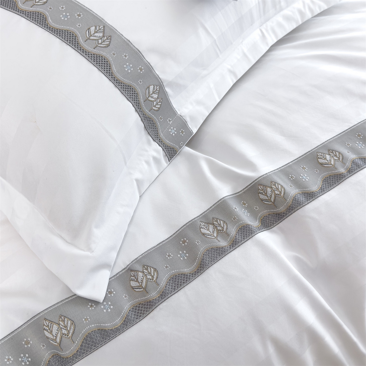 91家纺网 家纺一手货源 找家纺 梦庭帛美 2025新款酒店布草缎条刺绣款四件套 叶繁