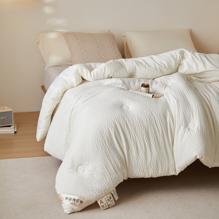 91家纺网 家纺一手货源 找家纺 大彩家居 2025新款A类亲肤泡泡纱棉花被被子被芯 白色