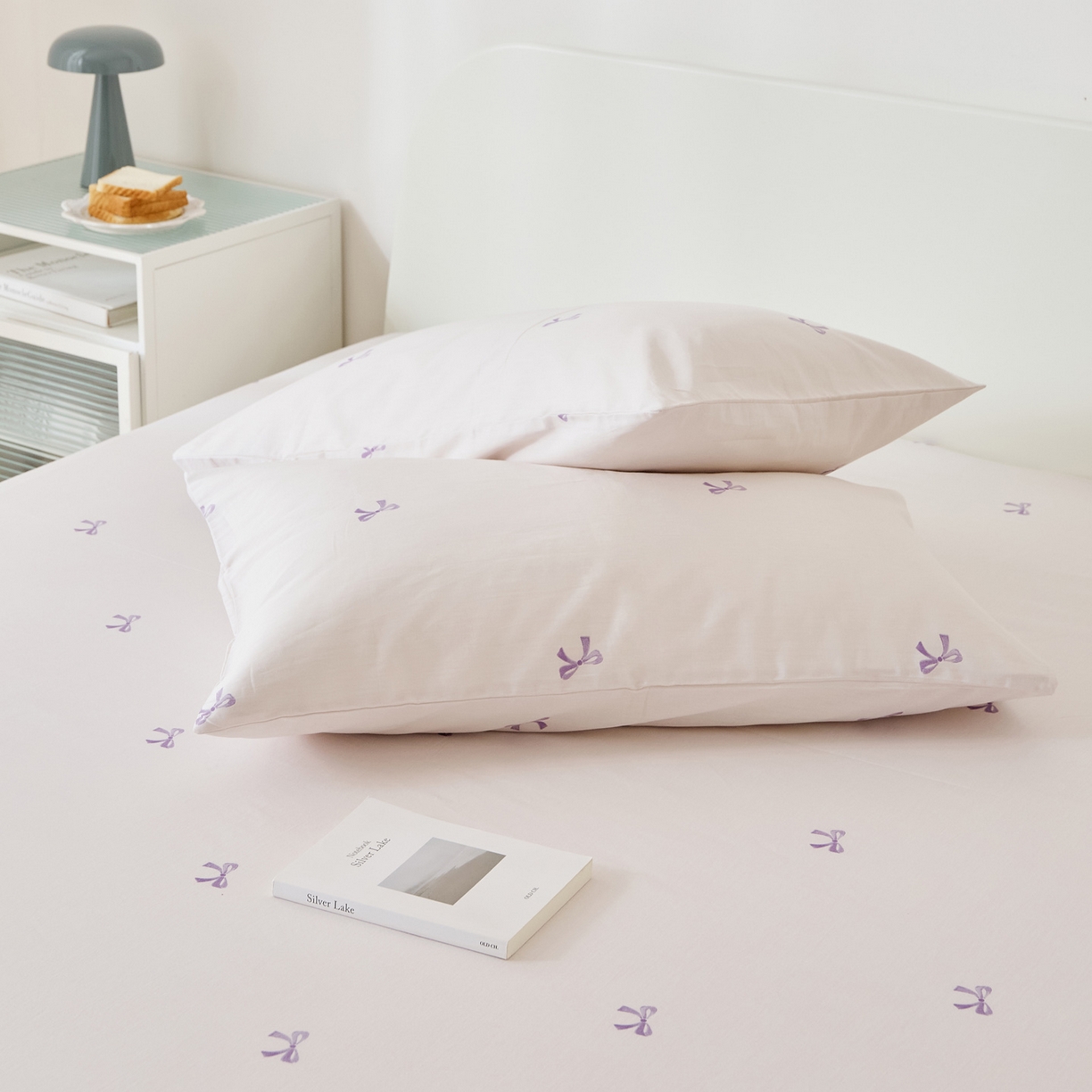 91家纺网 家纺一手货源 找家纺 EH家居 2025新款全棉小清新印花单枕套-织光系列 紫色蝴蝶结