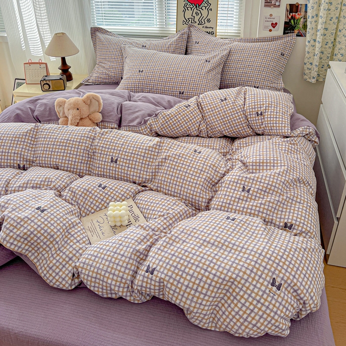 91家纺网 家纺一手货源 找家纺  一比一 2025新款古法水洗棉小布袋高克重云柔棉四件套 格纹紫蝶