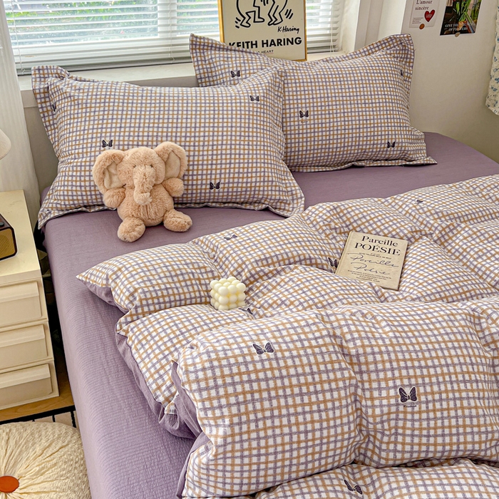 91家纺网 家纺一手货源 找家纺  一比一 2025新款古法水洗棉小布袋高克重云柔棉四件套 格纹紫蝶