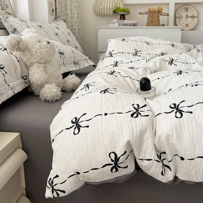 91家纺网 家纺一手货源 找家纺  一比一 2025新款古法水洗棉小布袋高克重云柔棉四件套 线条蝴蝶结