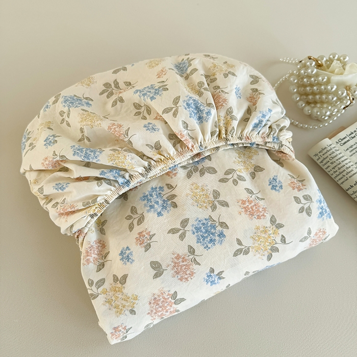 91家纺网 家纺一手货源 找家纺 卢赛尔 2025新款水洗珍珠棉皱皱纱印花床笠 山茶-绿